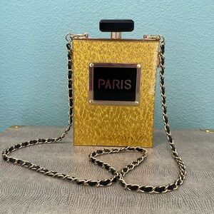 Gold Paris perfume bottle purse